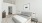 bedroom with bed and picture on wall