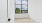 a room with a window and a tree outside